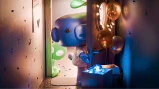 La mascotte Wumpus de Discord entourée de ballons et d'un cadeau, visuel officiel du lot de nouvelles fonctionnalités